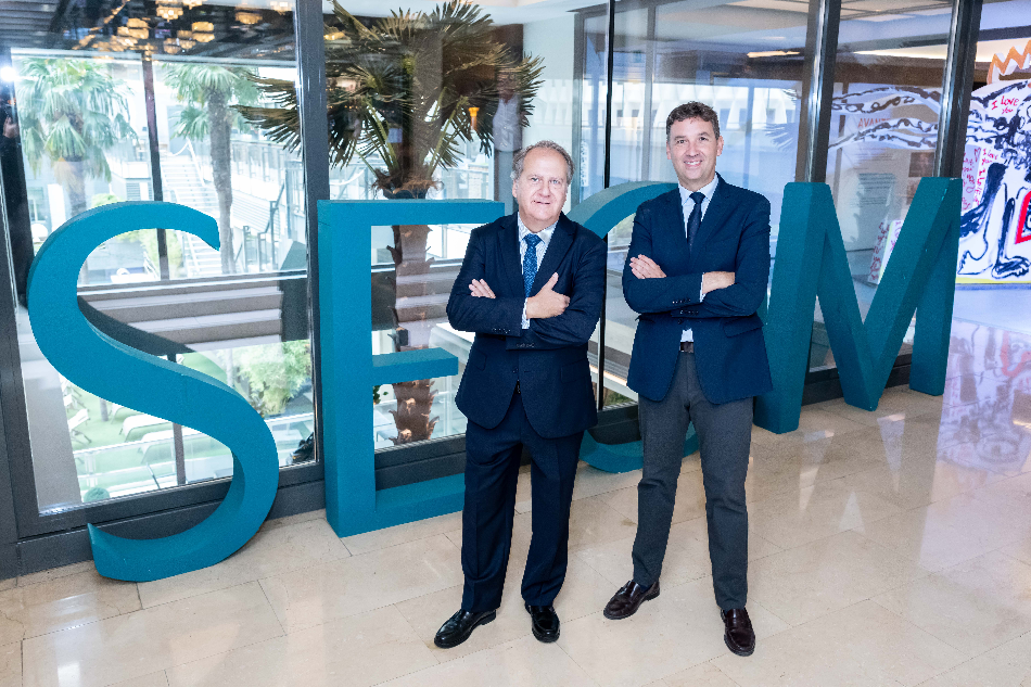 El Dr. de Castro, presidente de SEOM, junto al Dr. Puente, coordinador científico de SEOM2026